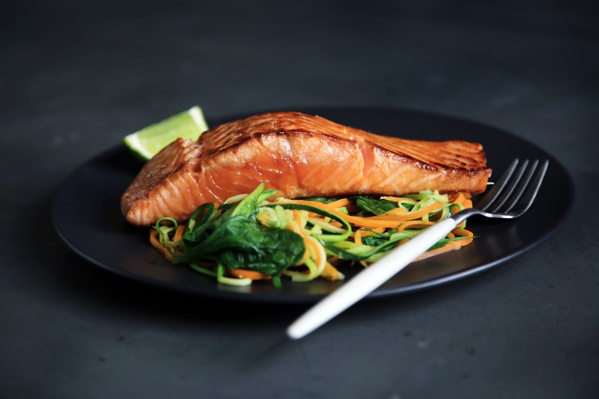 Crispy Hot Honey Salmon Bites with sesame seeds and lime